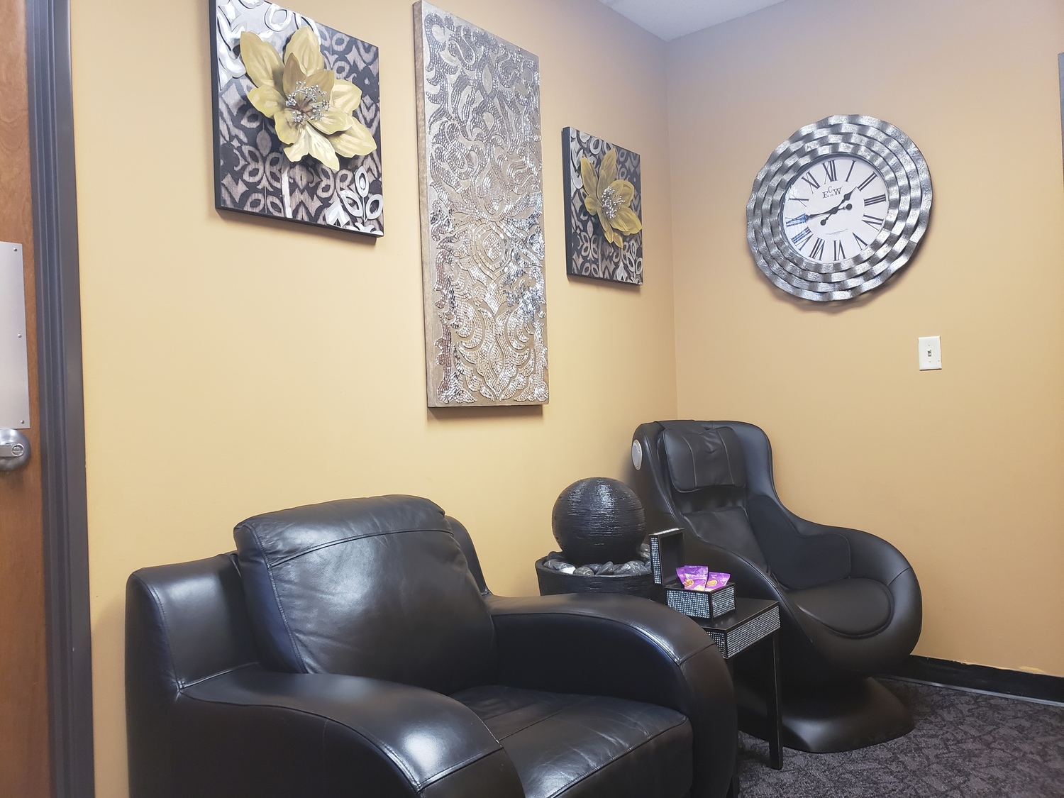 Gallery Photo of Sit in the massage chair and enjoy a FULL body massage to relax you while you wait