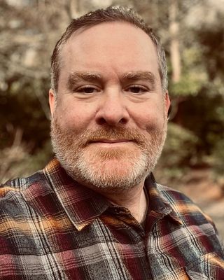 Photo of Justin Clarke, Counselor, LMHC