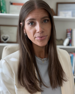 Photo of Alex Kase, Counselor, LMHC, LPC, LCPC