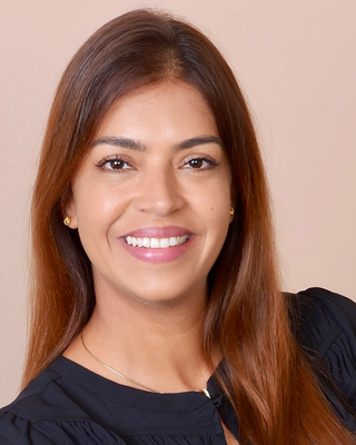 Photo of Monik Mossini, Licensed Mental Health Counselor, LMHC