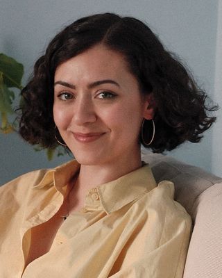 Photo of Andra Oprisanu, Psychotherapist, UKCP Trainee