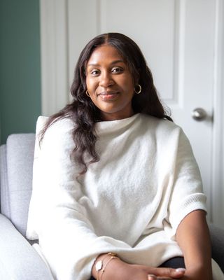 Photo of Nelly Ladan, Registered Social Worker, Hons BA, SSW, BSW, RSW