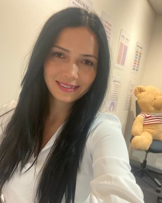 Photo of Christine El Hajj, Social Worker, AMHSW