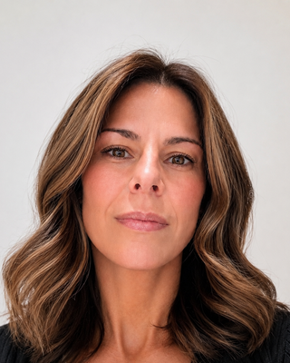 Photo of Amy Castongia, Licensed Clinical Mental Health Counselor, NCC, BC-TMH, LCMHC, LPC