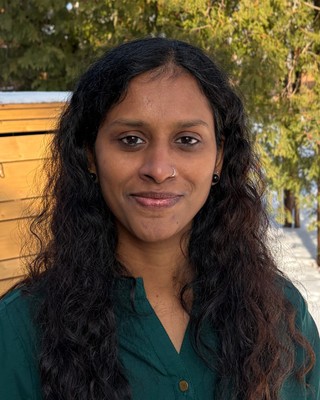 Photo of Dr. Rinju George, Psychologist, PhD