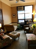 Gallery Photo of This is my consulting room. There is a small waiting area outside of it in the suite.