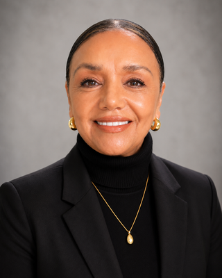 Photo of Dr. Maria E Moore, Marriage & Family Therapist, PhD, LMFT, LMHC
