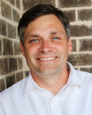 Photo of Nathan Oliver Ewell, Counselor, PLPC, MSN, RN