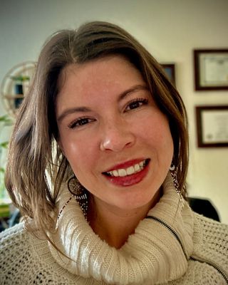 Photo of Holly Priscu, Licensed Clinical Professional Counselor , JD, LCPC, CFMHE, CCTP-II