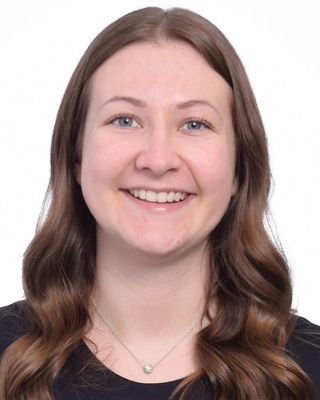 Photo of Justine Bourak, Registered Psychotherapist (Qualifying), MACP, B.Sc.