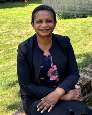 Photo of Divine Chinyere Ezewuzie, Psychiatric Nurse Practitioner, MSN, PMHNP, RN