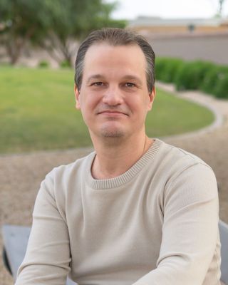 Photo of Adam Schutt, Counselor, MA, LAC