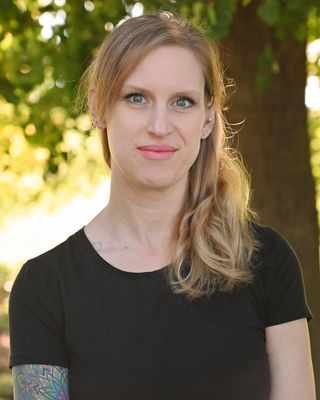 Photo of Amber Ellis, Licensed Mental Health Counselor, LMHC, ATR-BC, PMH-C