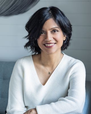 Photo of Natasha Ghosh, Counsellor, PhD, MEd, CHyp, RCC