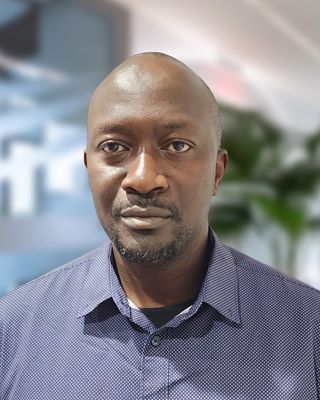 Photo of Peter Mukabire, Psychiatric Nurse Practitioner, MSN , PHMNP