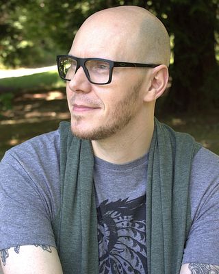 Photo of Daniel Littleton - Daniel Littleton - Brit Gamer & Geekery Therapist , LMHC, Counselor