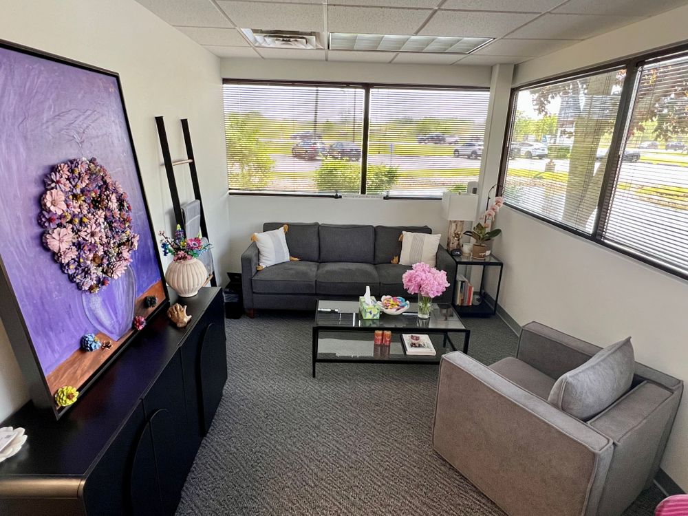 Step into a bright, calming space filled with natural light, vibrant art, and cozy seating. Your comfort and privacy are the top priority here.