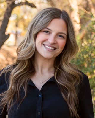 Photo of Megan Curtis, Counselor, MA, LPCC, NCC, CCTP