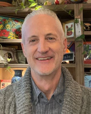 Photo of Darren Elliott, Registered Psychotherapist, RP, BBA, BED, CRPO, OCT