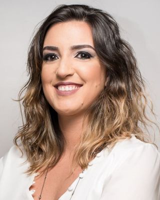 Photo of Paula Modenesi Lima, Pre-Licensed Professional