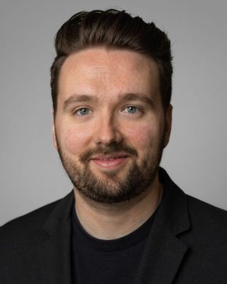 Photo of Tyler Wolf, Counselor, MS, LPC-IT