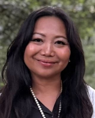 Photo of Eliza Rivera-Mitu, Psychiatric Nurse Practitioner, FNP-C, BC-ADM, PMHNPBC