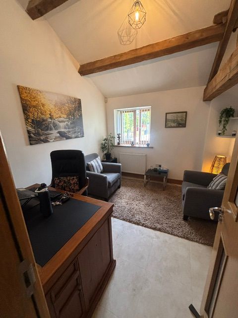 A calm, confidential space designed to help clients feel safe, heard, and comfortable exploring whatever they bring to therapy.
