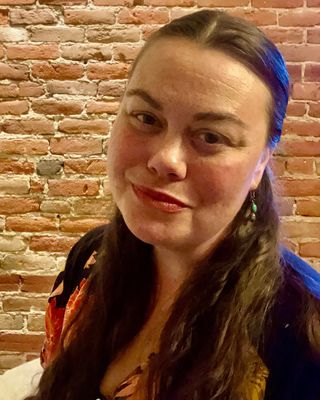 Photo of Micaela Cypher, Licensed Clinical Professional Counselor, MS, LCPC, R-DMT, EMDR