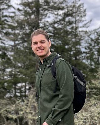 Photo of Keegan Baulkham, Counsellor, MACP, RCC