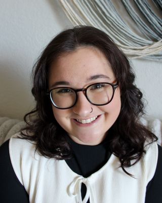 Photo of Emily Warren, Licensed Mental Health Counselor, LMHC, NCC, MS, EdS