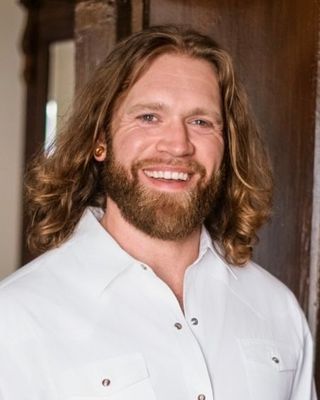 Photo of Dr. Connor Champion, Psychiatrist, MD, CST