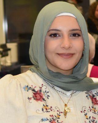 Photo of Asil Abuhammoud, Counselor, MS, LCMHCA