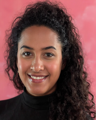 Photo of Regine Plummer, Counselor, LMHC, LPC