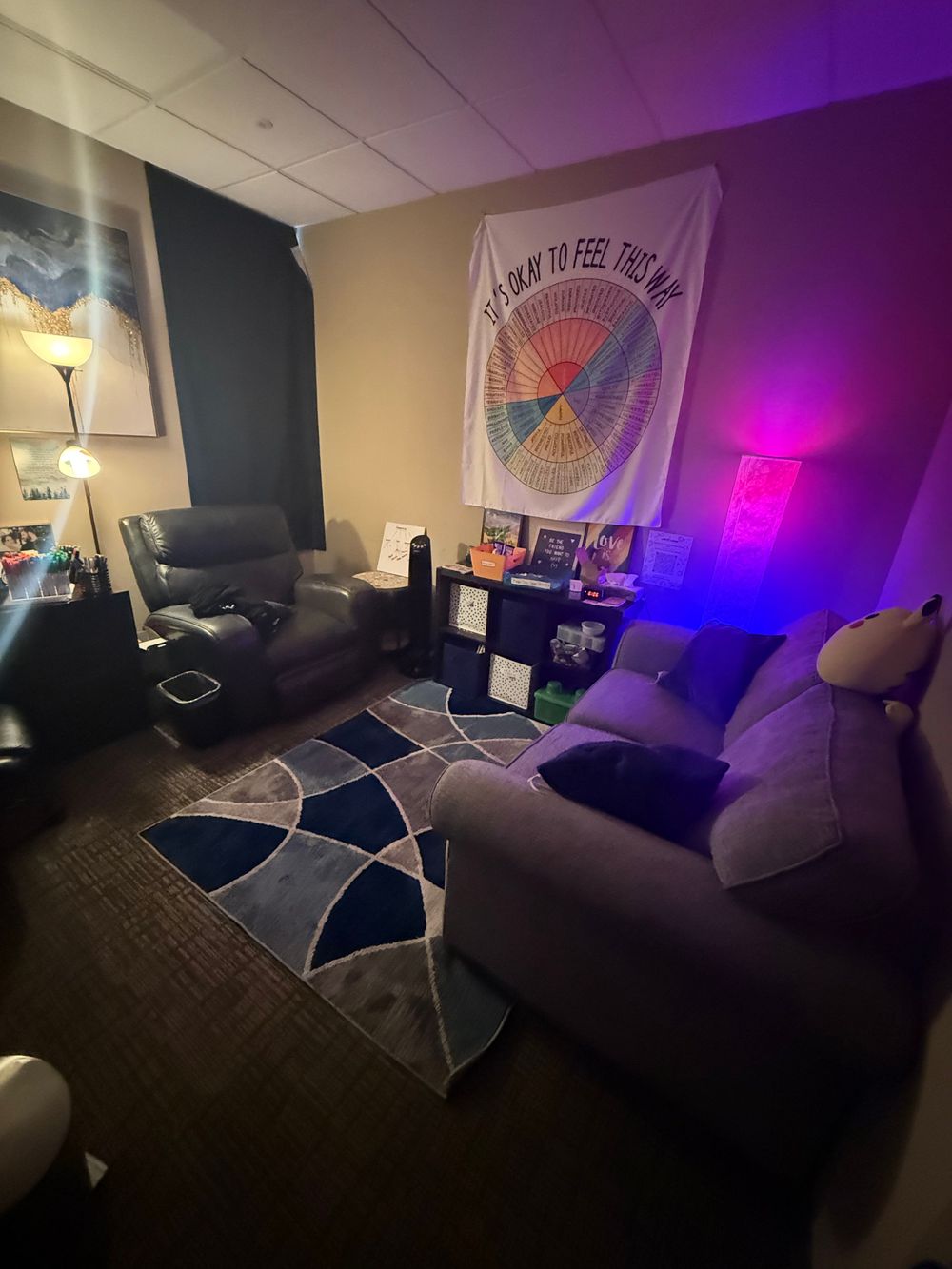 Comfy couch, good ambiance, snacks, hot beverage station, and stickers!