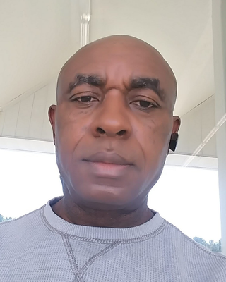Photo of Okechukwi Naji, Psychiatric Nurse Practitioner, PMHNP