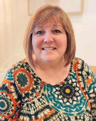 Photo of Christine Robertini, LPC, MHSP-S, NCC, CCMHC, Licensed Professional Counselor