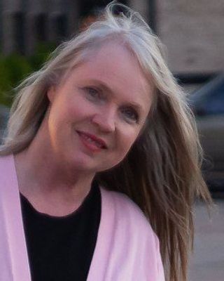 卡洛琳·史密斯·穆尔曼的照片，她是德克萨斯州达拉斯M街的执业专业顾问