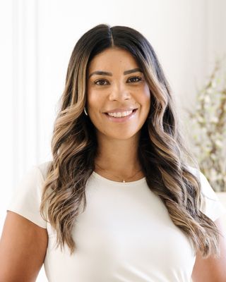 Photo of Tara Alexis Pouyat, Registered Social Worker, MSW, RSW, EMDR II