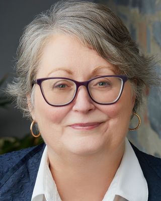 Photo of Kelly Collins, PhDCand, MA, MDiv, Registered Psychotherapist