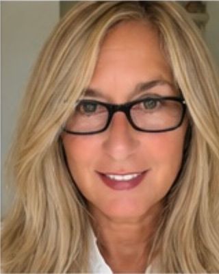Photo of Laura Spinelli, Licensed Professional Counselor, ATR-BC, LPC, BC-TMH