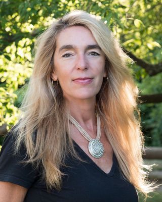 Photo of Jacqueline Dimick, Licensed Clinical Professional Counselor, LCPC, MEd, PCC, CYT, CHT