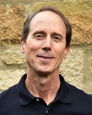 Photo of John D Jacobson, DVM, PhD, Psychologist in Lawrence