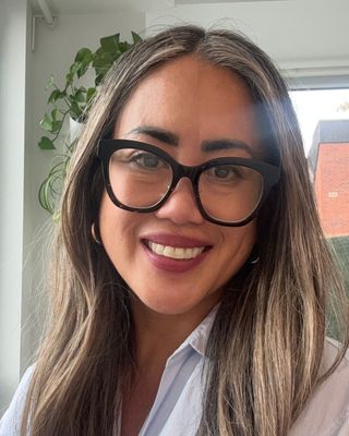 Photo of Isabel Ilumin, Registered Psychotherapist, MACP, BSW, BA