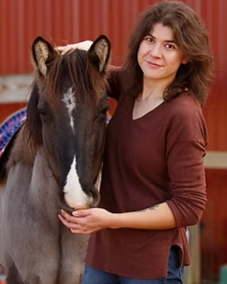 Photo of Em Loerzel, Clinical Social Work/Therapist, MSW, PhD