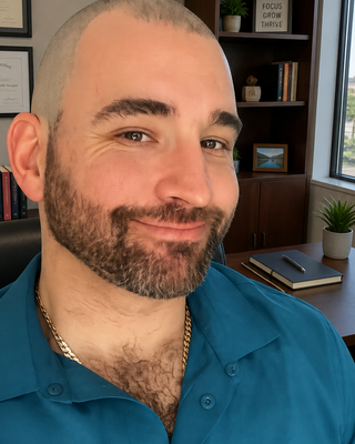 Photo of Dr. Justin Scott, Marriage & Family Therapist, PhD, LMFT, BCBA-D