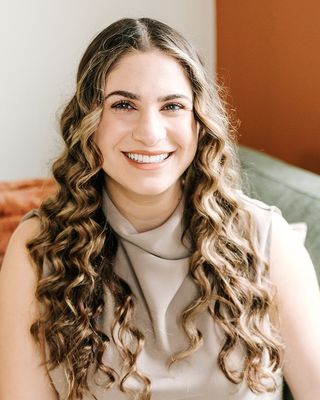 Photo of Denise Taher, Registered Psychotherapist, RP, MA, MSc