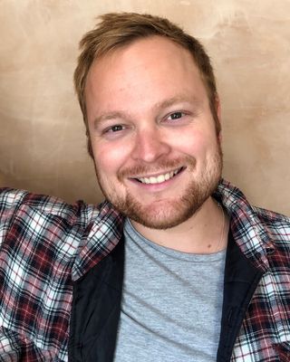 Photo of Dr Tom Davies, Psychotherapist, MBABCP