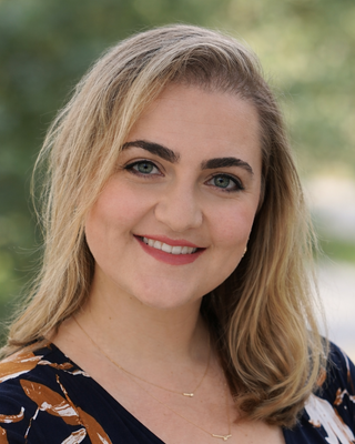 Photo of Dr. Elizabeth Zharovsky, Psychiatrist, MD, DABPN, DABOM