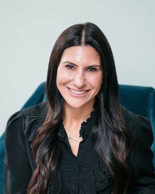 Photo of Nicolle Osequeda, Marriage & Family Therapist, LMFT, MA, MEd, CDWF