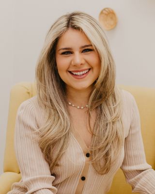 Photo of Marian Rivodo, RMHCI, MFT, Coach